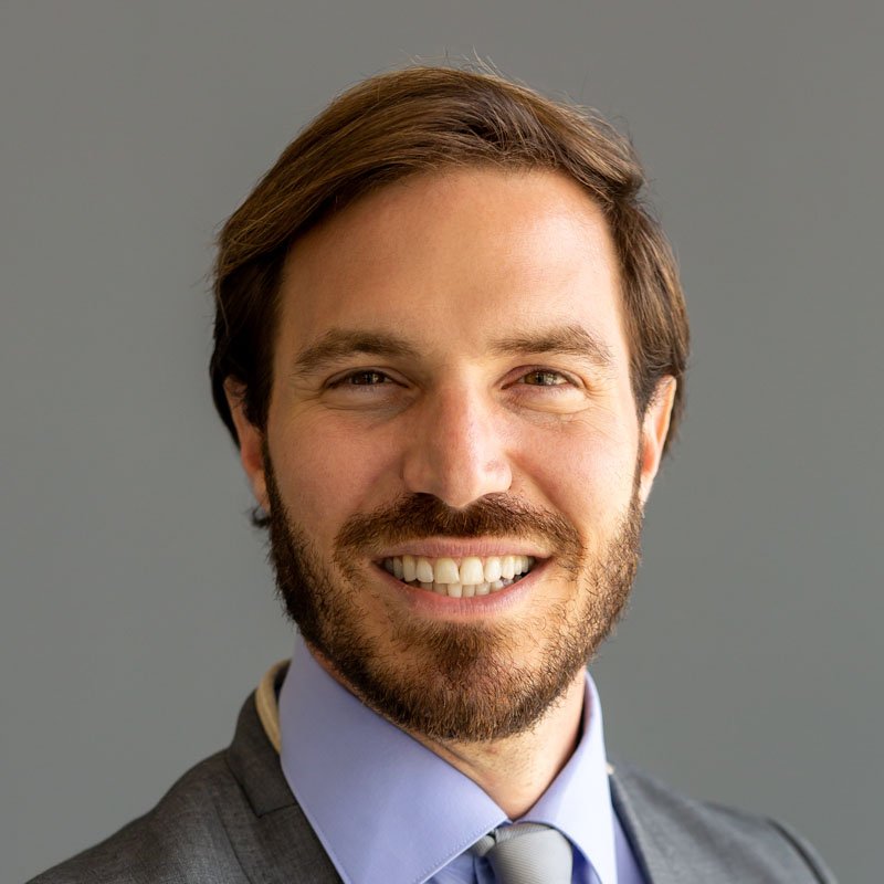 handsome smiling confident businessman portrait 2 2YV6JUA